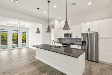 This home has all of the boxes checked!  Built 2022! Split on Royal Tee Country Club in Florida - for sale on GolfHomes.com, golf home, golf lot