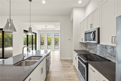 This home has all of the boxes checked!  Built 2022! Split on Royal Tee Country Club in Florida - for sale on GolfHomes.com, golf home, golf lot
