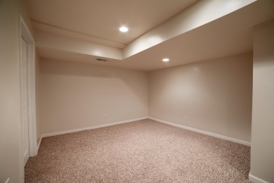 Experience a beautiful balance of style and convenience in this on Ellis Country Club in Kansas - for sale on GolfHomes.com, golf home, golf lot