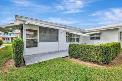 Only your toothbrush needed. Decorative Expanded Driveway on Leisureville Community Golf Course in Florida - for sale on GolfHomes.com, golf home, golf lot