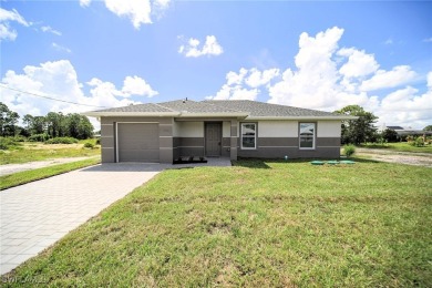 BRAND NEW CONSTRUCTION! You Will Be Amazed By The Quality Of on Mirror Lakes Golf Club in Florida - for sale on GolfHomes.com, golf home, golf lot