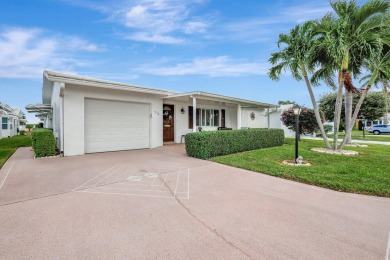 Only your toothbrush needed. Decorative Expanded Driveway on Leisureville Community Golf Course in Florida - for sale on GolfHomes.com, golf home, golf lot