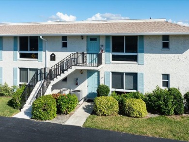 WOW! HERE IS AN AWESOME COZY 2ND FLOOR CONDOMINIUM LOCATED IN on The Glades Golf and Country Club in Florida - for sale on GolfHomes.com, golf home, golf lot