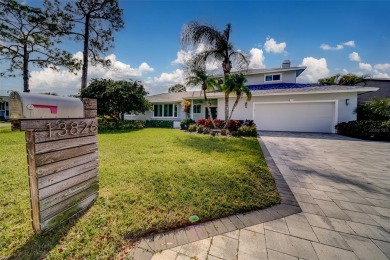 Under contract-accepting backup offers. Discover your dream home on Feather Sound Country Club in Florida - for sale on GolfHomes.com, golf home, golf lot