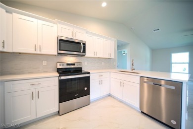 BRAND NEW CONSTRUCTION! You Will Be Amazed By The Quality Of on Mirror Lakes Golf Club in Florida - for sale on GolfHomes.com, golf home, golf lot