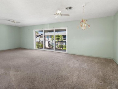 WOW! HERE IS AN AWESOME COZY 2ND FLOOR CONDOMINIUM LOCATED IN on The Glades Golf and Country Club in Florida - for sale on GolfHomes.com, golf home, golf lot