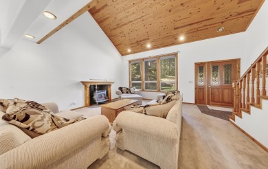 Welcome to this lovely mountain cabin on a quiet street in the on Lake Almanor Country Club in California - for sale on GolfHomes.com, golf home, golf lot