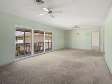 WOW! HERE IS AN AWESOME COZY 2ND FLOOR CONDOMINIUM LOCATED IN on The Glades Golf and Country Club in Florida - for sale on GolfHomes.com, golf home, golf lot