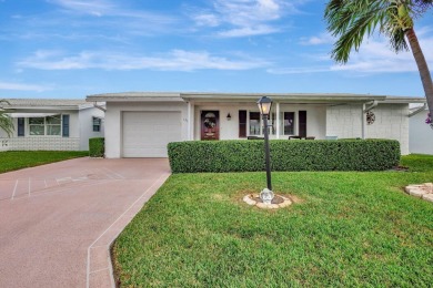 Lots of extras in this extended challenger model.starting with on Leisureville Community Golf Course in Florida - for sale on GolfHomes.com, golf home, golf lot