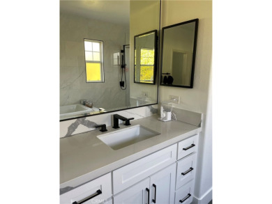 Just off the luscious Mesa Verde golf course is the Cornerstone on Costa Mesa Golf and Country Club in California - for sale on GolfHomes.com, golf home, golf lot