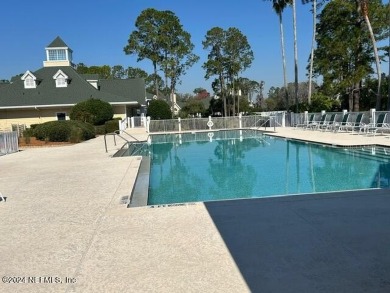 This fantastic 4 bedroom, 4 bathroom modern condo with a garage on Slammer and Squire Golf Course in Florida - for sale on GolfHomes.com, golf home, golf lot