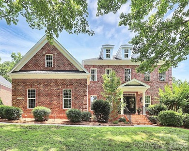 Discover refined living in this elegant full brick home on 3rd on The Palisades Country Club in North Carolina - for sale on GolfHomes.com, golf home, golf lot