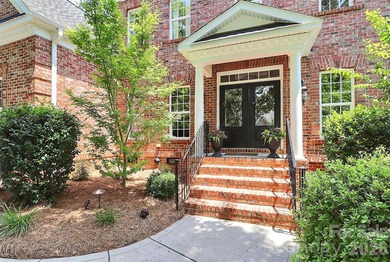 Discover refined living in this elegant full brick home on 3rd on The Palisades Country Club in North Carolina - for sale on GolfHomes.com, golf home, golf lot