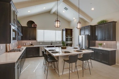Expansive great room and dining area with optional vaulted on Verrado Golf Club - Victory in Arizona - for sale on GolfHomes.com, golf home, golf lot