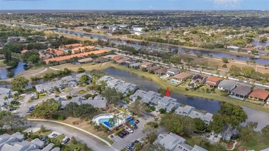 Great buy! Just reduced! Spacious, bright corner-unit townhome on Woodmont Country Club in Florida - for sale on GolfHomes.com, golf home, golf lot