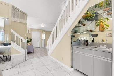 Great buy! Just reduced! Spacious, bright corner-unit townhome on Woodmont Country Club in Florida - for sale on GolfHomes.com, golf home, golf lot