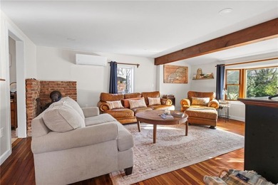 Welcome to 151 Ives Road, a bright and charming 3-bedroom home on Potowomut Golf Club in Rhode Island - for sale on GolfHomes.com, golf home, golf lot