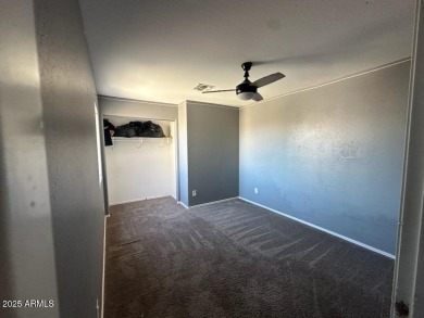 Investor special! Spacious 5-bedroom, 2.5-bath fixer-upper on Oasis Golf Club in Arizona - for sale on GolfHomes.com, golf home, golf lot