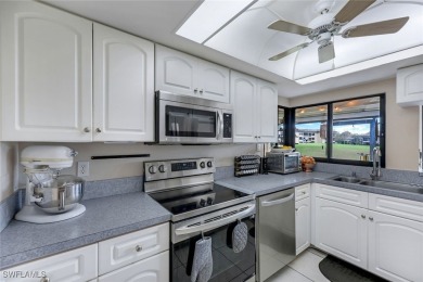 Enjoy golf course views and resort-style living in this on Hideaway Country Club in Florida - for sale on GolfHomes.com, golf home, golf lot