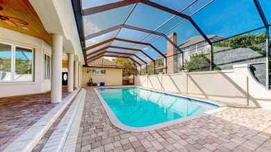 Mediterranean Estate With Marsh Views & Saltwater Pool In A on Marsh Creek Country Club in Florida - for sale on GolfHomes.com, golf home, golf lot