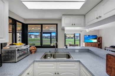 Enjoy golf course views and resort-style living in this on Hideaway Country Club in Florida - for sale on GolfHomes.com, golf home, golf lot