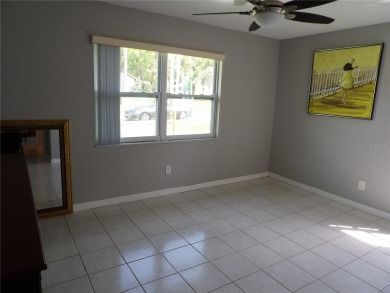 What a GEM of a house....Great Curb Appeal.....  Just a Hop on Highland Lakes Executive Golf Course in Florida - for sale on GolfHomes.com, golf home, golf lot