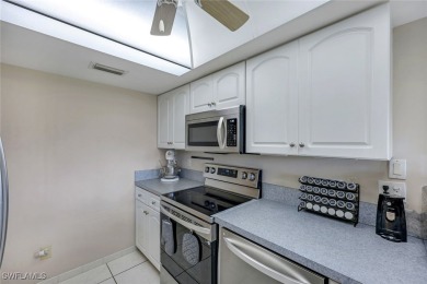 Enjoy golf course views and resort-style living in this on Hideaway Country Club in Florida - for sale on GolfHomes.com, golf home, golf lot