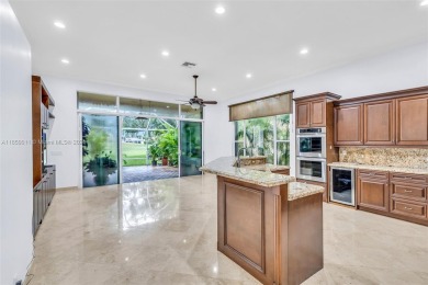 OWNER TO PAY FOR NEW ROOF! FABULOUS HOME IN HIGHLY DESIREABLE on Weston Hills Country Club in Florida - for sale on GolfHomes.com, golf home, golf lot