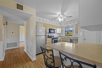 Discover the perfect blend of charm and comfort in this well on North Lakes Golf Course in Florida - for sale on GolfHomes.com, golf home, golf lot