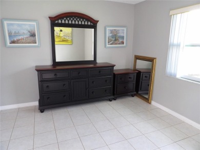 What a GEM of a house....Great Curb Appeal.....  Just a Hop on Highland Lakes Executive Golf Course in Florida - for sale on GolfHomes.com, golf home, golf lot
