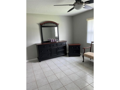 What a GEM of a house....Great Curb Appeal.....  Just a Hop on Highland Lakes Executive Golf Course in Florida - for sale on GolfHomes.com, golf home, golf lot