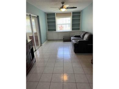 What a GEM of a house....Great Curb Appeal.....  Just a Hop on Highland Lakes Executive Golf Course in Florida - for sale on GolfHomes.com, golf home, golf lot