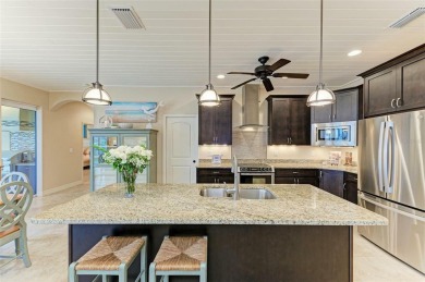 WATERFRONT LUXURY AWAITS at this gorgeous 2013 built custom POOL on Saint Andrews South Golf Club in Florida - for sale on GolfHomes.com, golf home, golf lot