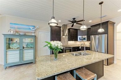 WATERFRONT LUXURY AWAITS at this gorgeous 2013 built custom POOL on Saint Andrews South Golf Club in Florida - for sale on GolfHomes.com, golf home, golf lot