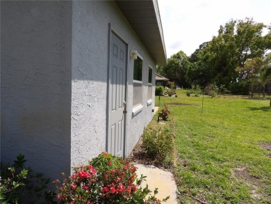 What a GEM of a house....Great Curb Appeal.....  Just a Hop on Highland Lakes Executive Golf Course in Florida - for sale on GolfHomes.com, golf home, golf lot