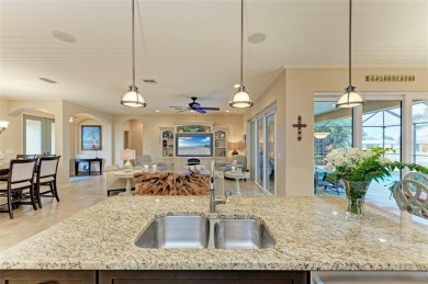 WATERFRONT LUXURY AWAITS at this gorgeous 2013 built custom POOL on Saint Andrews South Golf Club in Florida - for sale on GolfHomes.com, golf home, golf lot