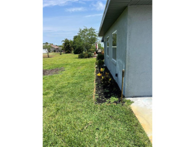 What a GEM of a house....Great Curb Appeal.....  Just a Hop on Highland Lakes Executive Golf Course in Florida - for sale on GolfHomes.com, golf home, golf lot