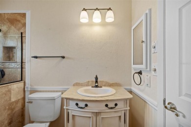 Discover the perfect blend of charm and comfort in this well on North Lakes Golf Course in Florida - for sale on GolfHomes.com, golf home, golf lot