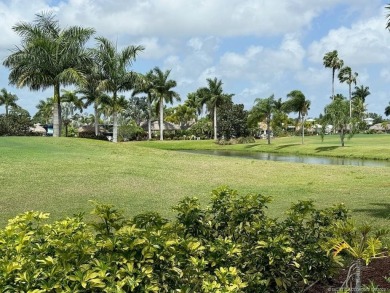 This prime pull-in lot offers breathtaking golf course and water on Motorcoach Resort Golf Course in Florida - for sale on GolfHomes.com, golf home, golf lot