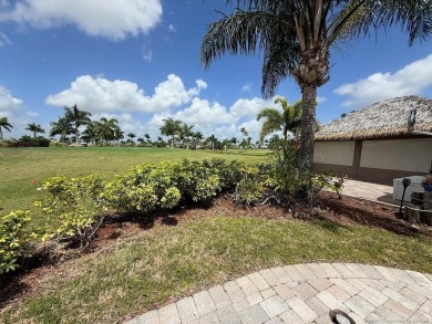 This prime pull-in lot offers breathtaking golf course and water on Motorcoach Resort Golf Course in Florida - for sale on GolfHomes.com, golf home, golf lot