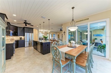 WATERFRONT LUXURY AWAITS at this gorgeous 2013 built custom POOL on Saint Andrews South Golf Club in Florida - for sale on GolfHomes.com, golf home, golf lot