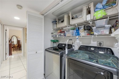 Enjoy golf course views and resort-style living in this on Hideaway Country Club in Florida - for sale on GolfHomes.com, golf home, golf lot