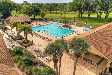 What a GEM of a house....Great Curb Appeal.....  Just a Hop on Highland Lakes Executive Golf Course in Florida - for sale on GolfHomes.com, golf home, golf lot