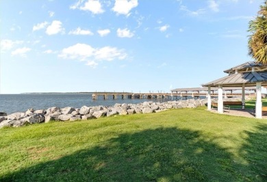 Don't let the darling front porch and quaint facade fool you on Sea Island Golf Club in Georgia - for sale on GolfHomes.com, golf home, golf lot