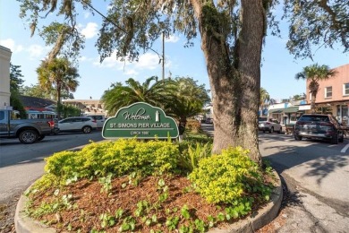 Don't let the darling front porch and quaint facade fool you on Sea Island Golf Club in Georgia - for sale on GolfHomes.com, golf home, golf lot
