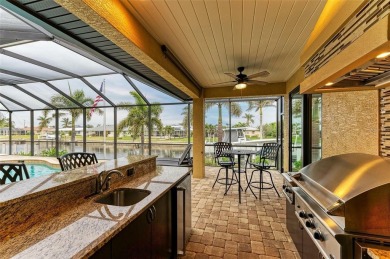 WATERFRONT LUXURY AWAITS at this gorgeous 2013 built custom POOL on Saint Andrews South Golf Club in Florida - for sale on GolfHomes.com, golf home, golf lot