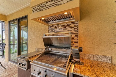 WATERFRONT LUXURY AWAITS at this gorgeous 2013 built custom POOL on Saint Andrews South Golf Club in Florida - for sale on GolfHomes.com, golf home, golf lot