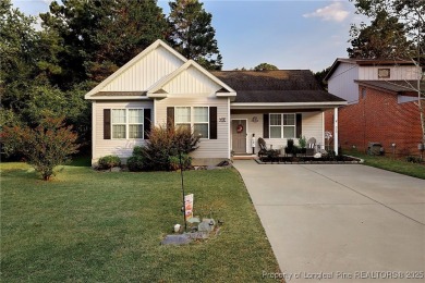 This gorgeous home is ready for its new owner. Nestled in the on Carolina Trace Country Club in North Carolina - for sale on GolfHomes.com, golf home, golf lot