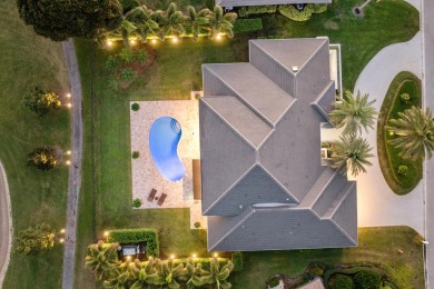 A Masterpiece of Modern Luxury and Timeless EleganceThis on Atlantis Golf Club in Florida - for sale on GolfHomes.com, golf home, golf lot