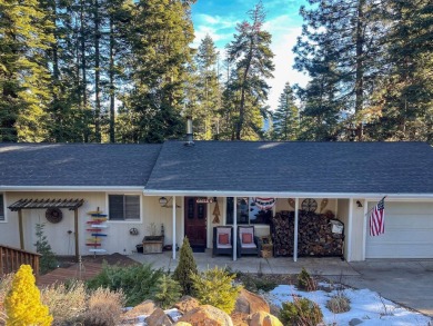 This wonderfully updated 3-bedroom, 2-bathroom home is nestled on Lake Almanor Country Club in California - for sale on GolfHomes.com, golf home, golf lot